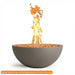 Warming Trends AON Aura 37.5" concrete fire bowl in color charcoal with a tall, active flame rising from the lava rock media.